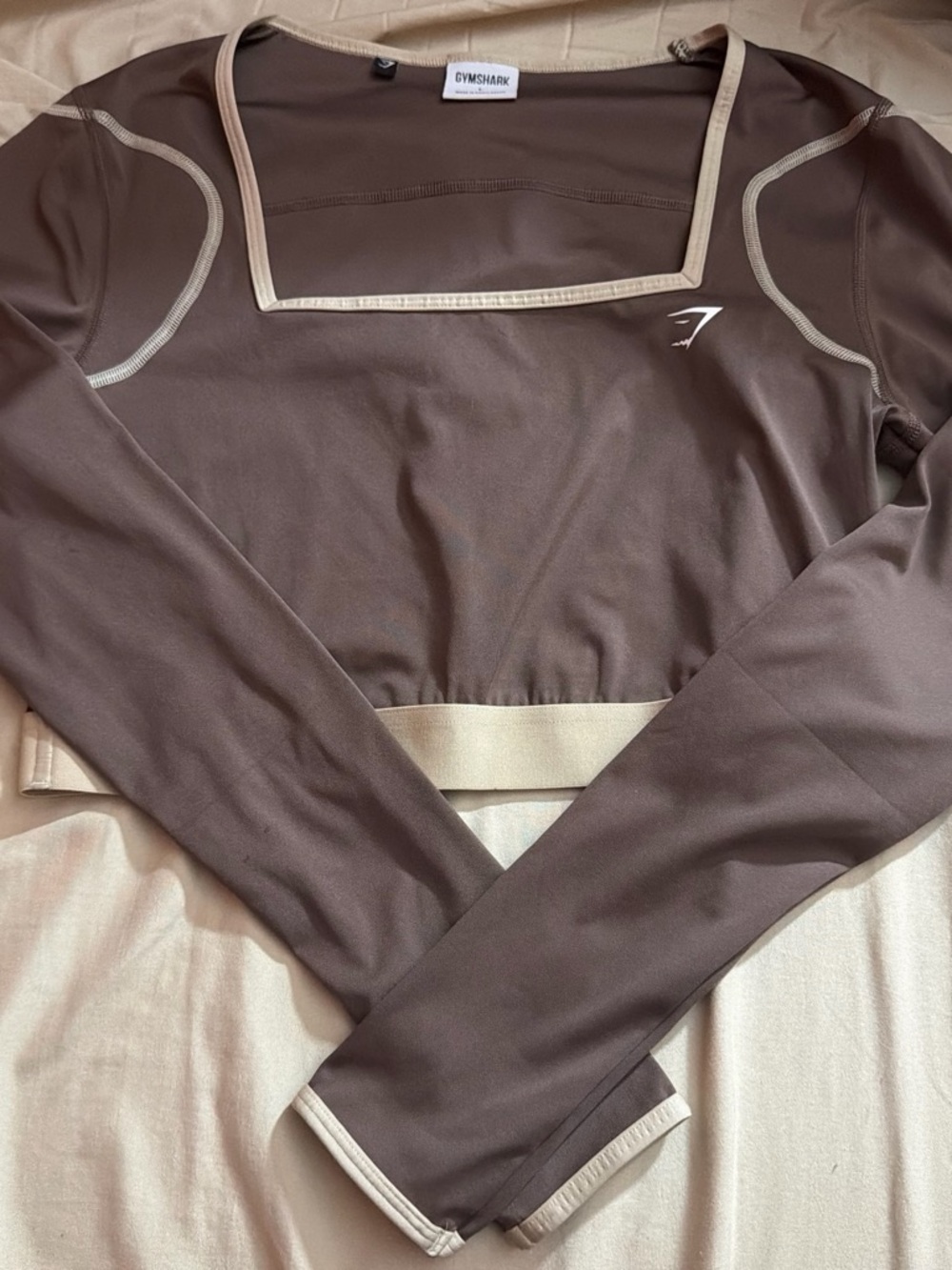 Gymshark Brown Long-Sleeve Cropped Athletic Top with Cream Trim
